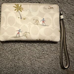 Coach Beige Wristlet with Tropical Design
